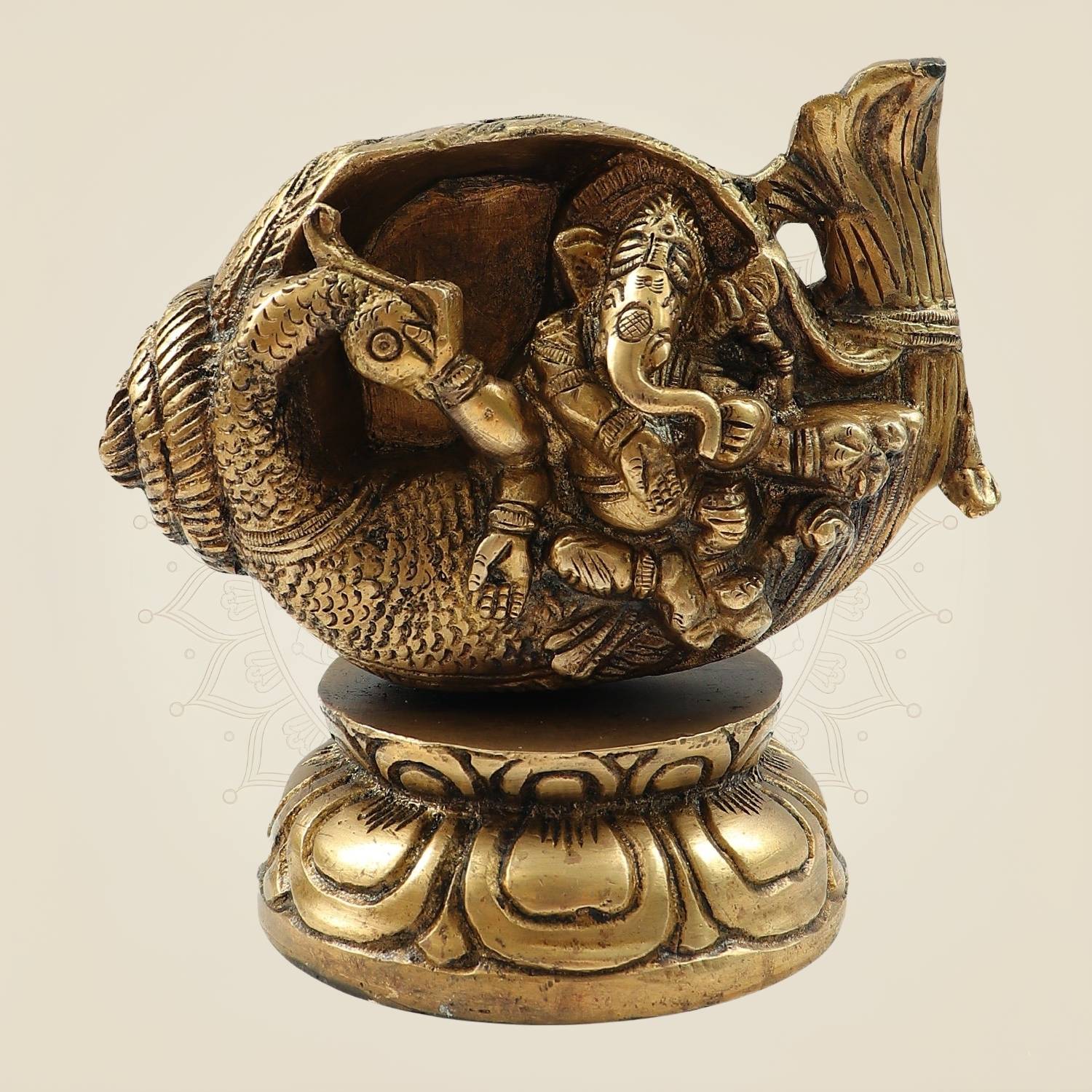 Divine Brass Ganesh Sitting in Shankh on Peacock Design Idol for Home Décor 5.5"
