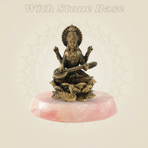 Bronze Chaturbhuja Saraswati Idol on Lotus on pink stone