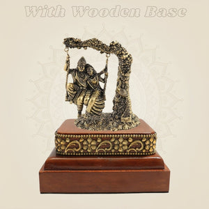Brass Radha Krishna Murti on Swing with Square Wooden Base