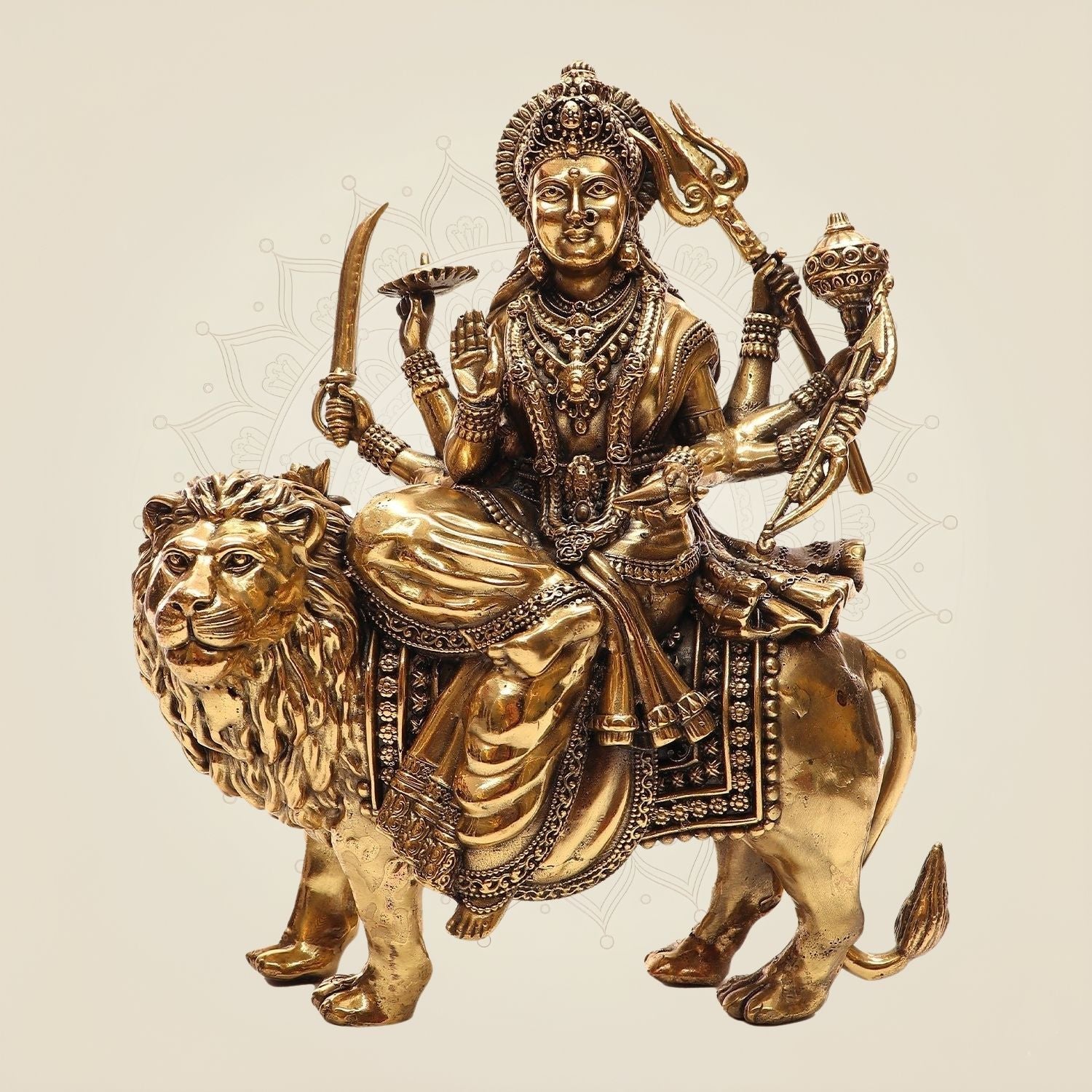 Brass Goddess Durga Idol on Lion • Divine Multi-Armed Idol with Shakti Weapon – 9.25"