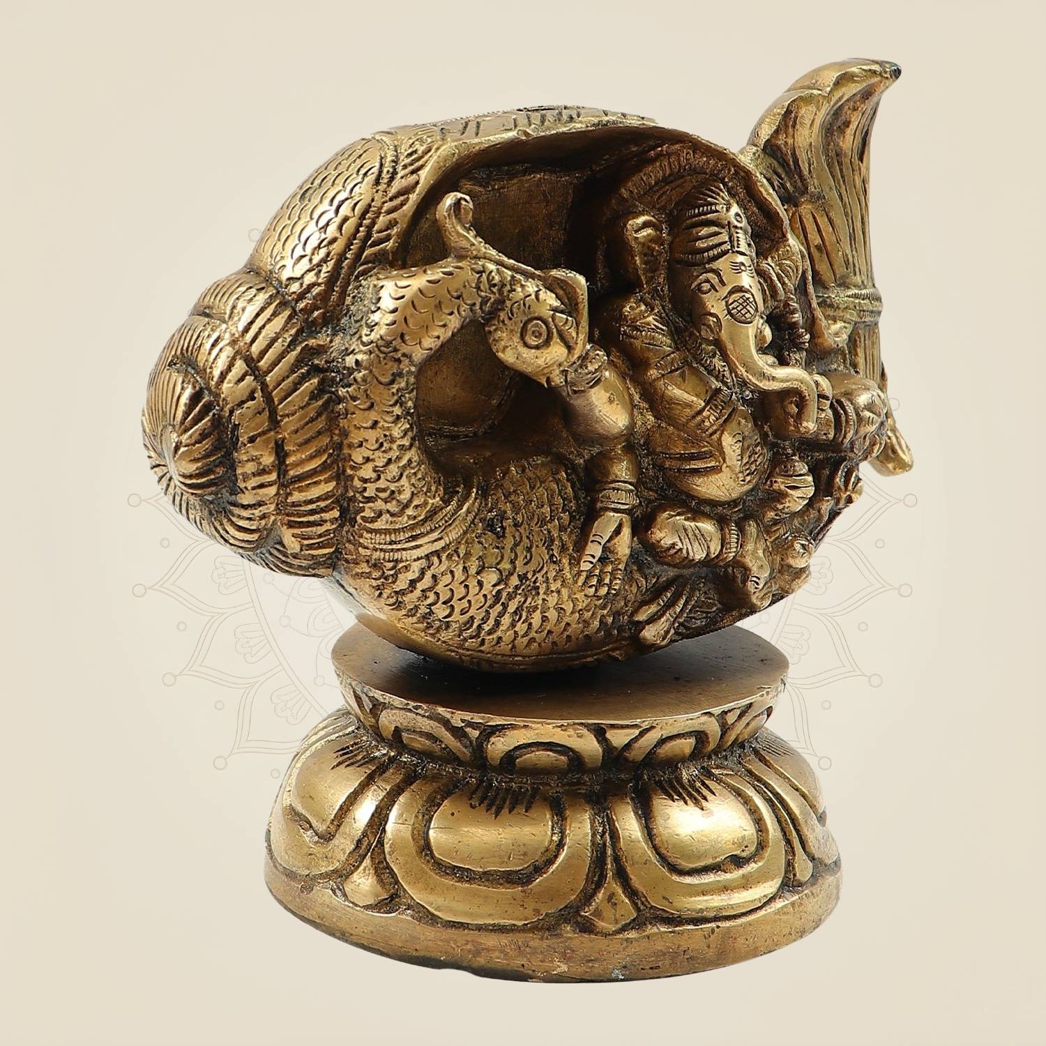 Divine Brass Ganesh Sitting in Shankh on Peacock Design Idol for Home Décor 5.5"