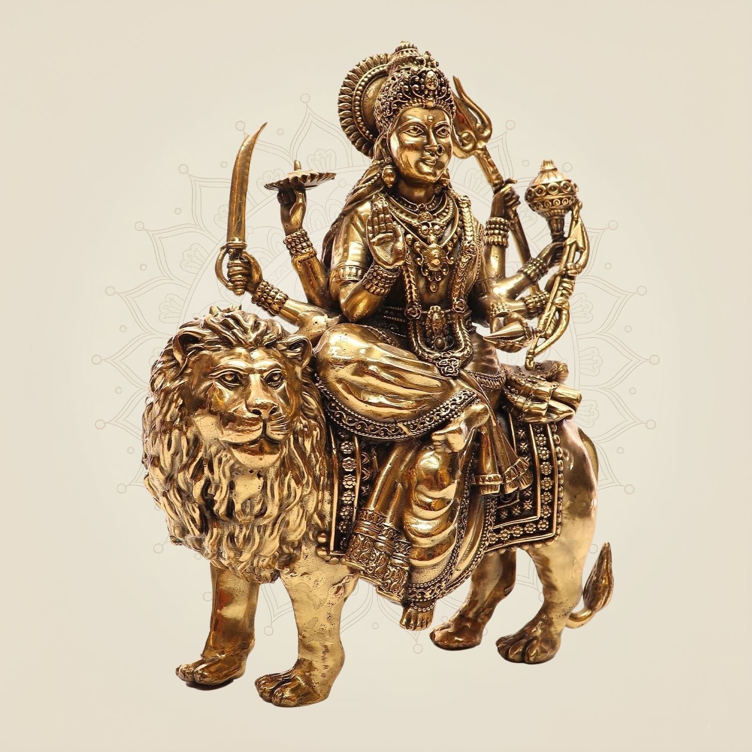 Brass Goddess Durga Idol on Lion • Divine Multi-Armed Idol with Shakti Weapon – 9.25"