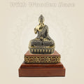 Brass Buddha Statue Composed on a Square Wooden Base