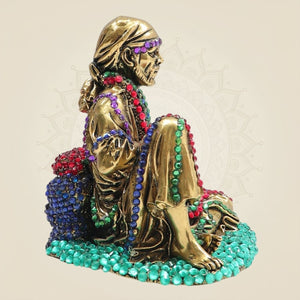Brass Sai Baba Seated Statue 4" with Vibrant Jewellery Stone Detailing - Luxeartisanship